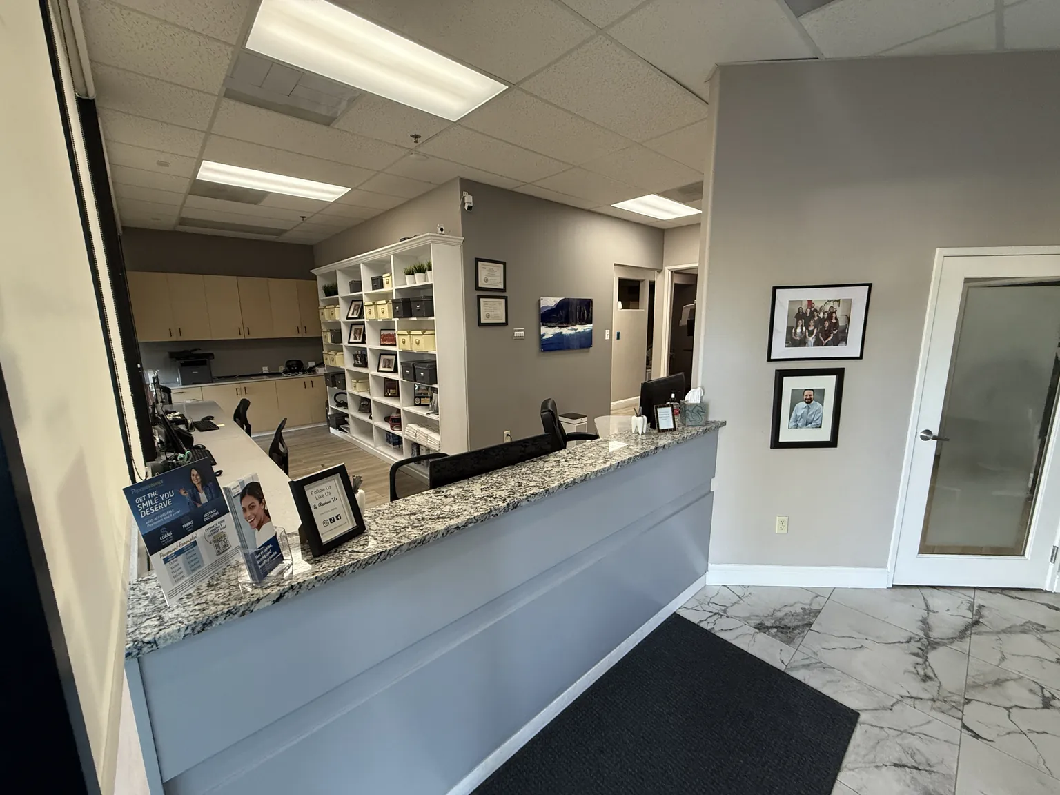 Front reception desk and granite counter at Sacramento Dental Medicine