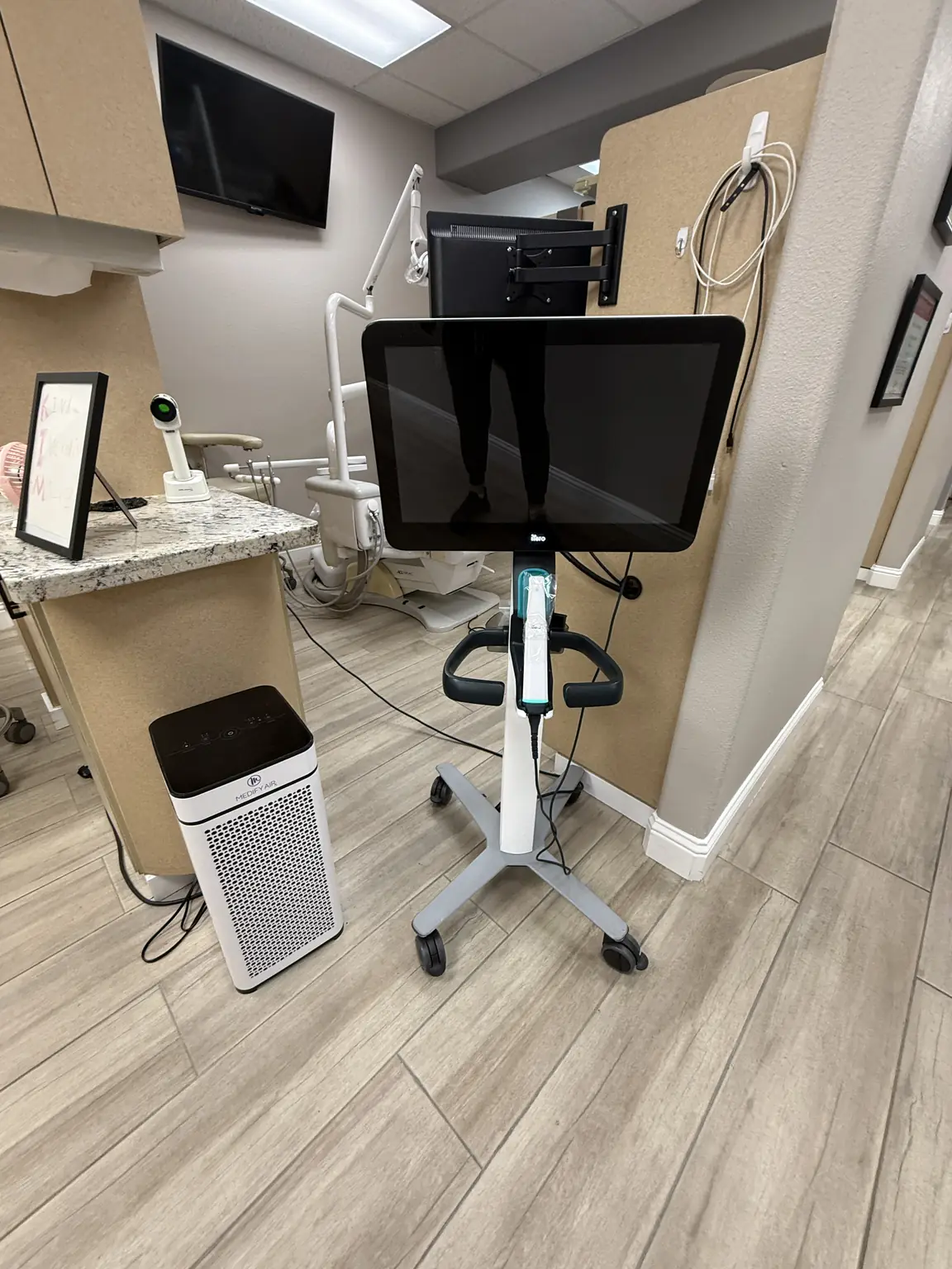 Intraoral scanner and air purifier in a treatment room at the Elverta Road office